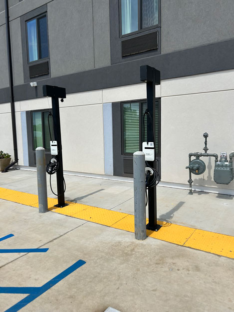 2 7.6kWh Level 2 Loop EV Chargers Installed with Cable Management Posts